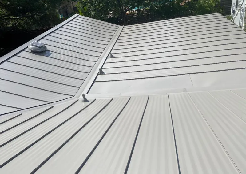 Solar attic fan installed on a metal roof for Roof Ventilation in Golden Valley